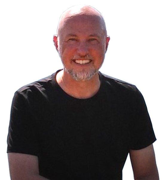 a man smiling with a grey beard wearing a black shirt